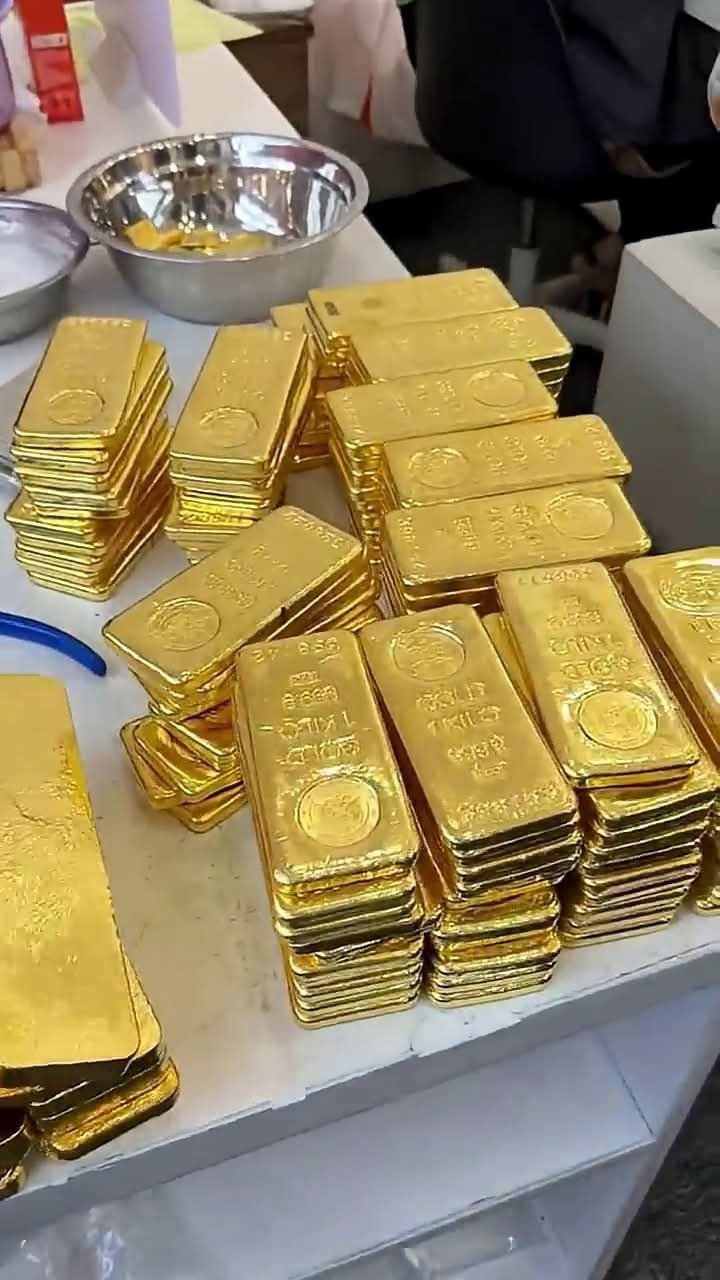 Sourced gold bars staged for documentation